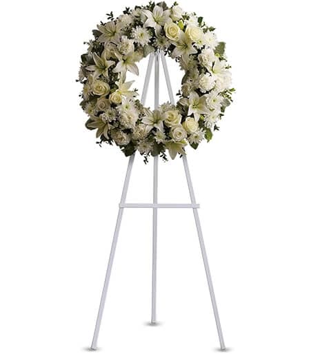Round funeral wreath of fresh flowers